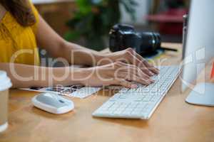 Female graphic designer working on computer