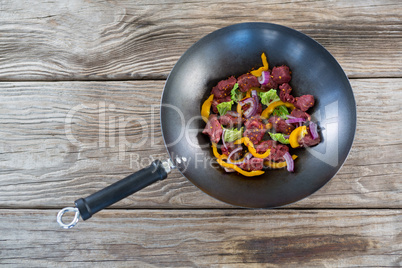 Diced beef in frying pan