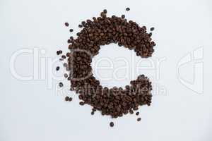 Coffee beans forming alphabet C