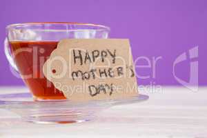 Happy mothers day card with cup of herbal tea