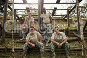 Soldiers sitting on the obstacle course in boot camp