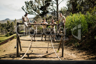 Soldiers standing on the obstacle course