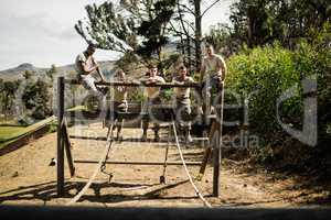 Soldiers standing on the obstacle course