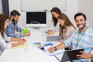 Executives working in conference room