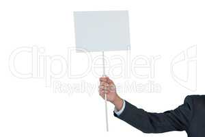 Hand of businessman holding blank placard