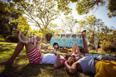 Friends clicking selfie on mobile phones