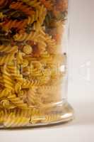 Girandole pasta in a glass container