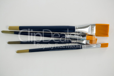 Paintbrushes on white background