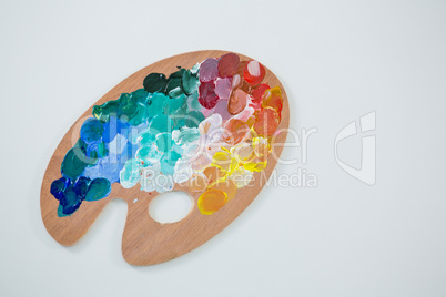 Wooden palette with various watercolor