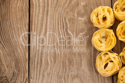 Fettuccine pasta arranged in a row