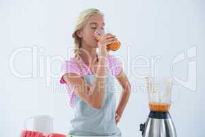 Woman drinking smoothie