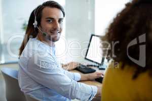 Customer service executive working at office