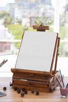 Easel with blank canvas