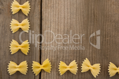 Farfalle pasta arranged in a row