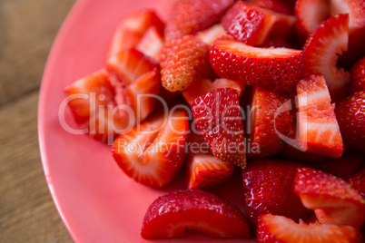 Close-up of strawberries slices in plate