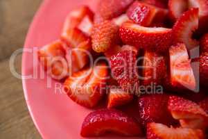 Close-up of strawberries slices in plate