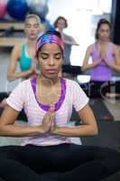 Group of women doing yoga