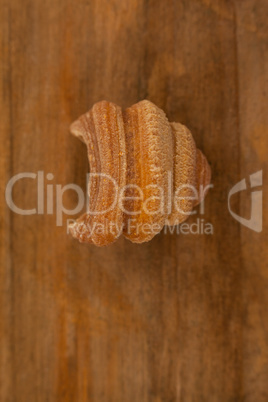 Conchiglie pasta on wooden background