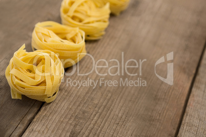 Fettuccine pasta arranged in a row