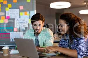 Creative business people working on desk