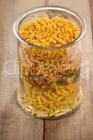Girandole pasta in a glass container