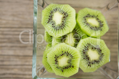 Slices of kiwi in glass bowl