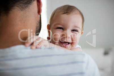 Father holding his baby girl