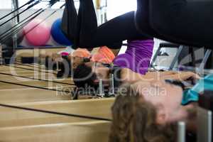 Group of women exercising on reformer