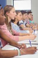 Students studying in classroom