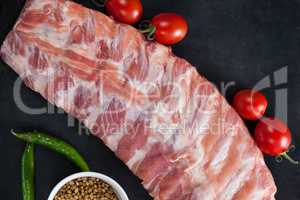 Beef ribs, cherry tomatoes and coriander seeds