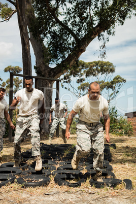 Trainer giving training to military soldiers