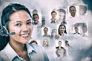 Composite image of smiling businesswoman using headset