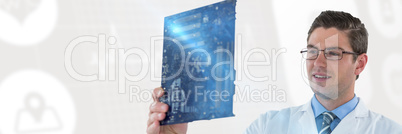 Composite image of computer engineer holding motherboard