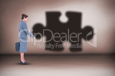 Composite image of businesswoman standing isolated on white background