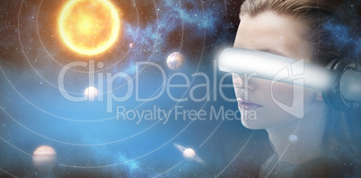 Composite image of close up of brunette experiencing virtual reality simulator 3d