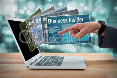 Composite image of businessman gesturing at laptop screen 3d
