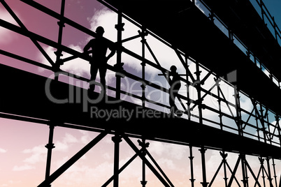 Composite image of smiling worker carrying wooden planks 3d