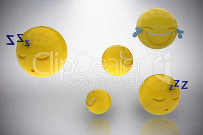 Composite image of three dimensional image of various emoticons 3d