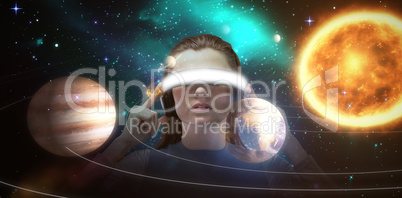 Composite image of beautiful brunette using virtual reality headset 3d