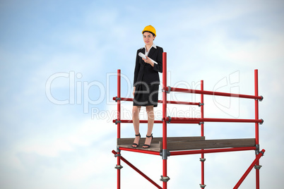 Composite image of smiling architect with hard hat 3d