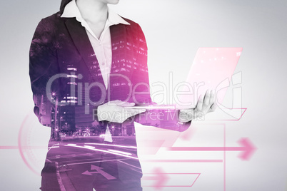 Composite image of cropped image of businesswoman holding laptop computer 3d