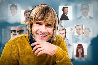 Composite image of smiling hipster businessman using headset