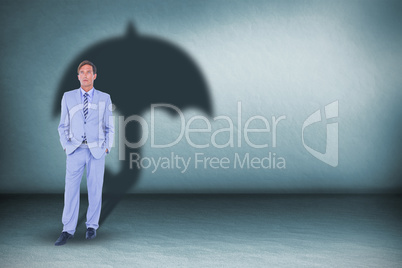 Composite image of  standing businessman