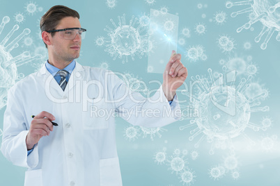 Composite image of doctor pretending to be using futuristic digital tablet 3d