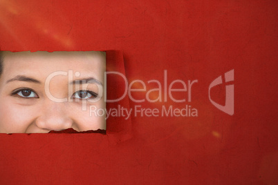 Composite image of smiling woman looking at camera 3d