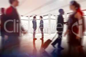 Composite image of businessmen talking