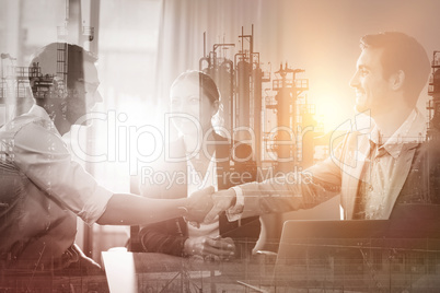 Business colleagues handshaking