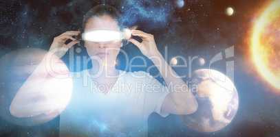Composite image of young woman with virtual video glasses 3d