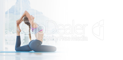 Fit woman stretching body in exercise room