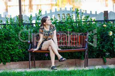 Woman sitting on a bench